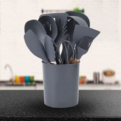 Faites la meilleure cuisine avec des ustensiles de cuisine en silicone et une poignée en bois