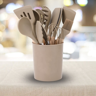 Faites la meilleure cuisine avec des ustensiles de cuisine en silicone et une poignée en bois