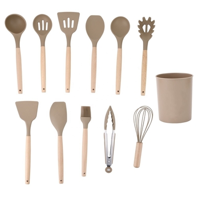 Faites la meilleure cuisine avec des ustensiles de cuisine en silicone et une poignée en bois